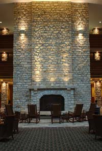 A view of the stone fireplace in the lobby of the new lodge.